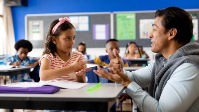 Teacher classroom teaching sign language